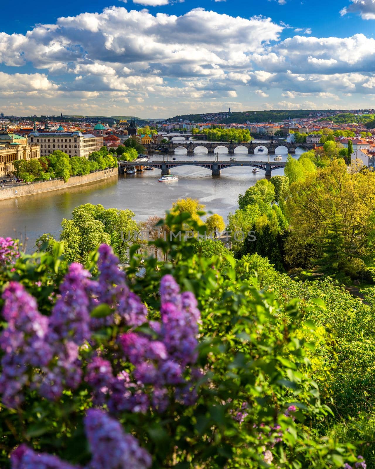 Scenic view of the Old Town pier architecture and Charles Bridge over Vltava river in Prague, Czech Republic. Prague iconic Charles Bridge (Karluv Most) and Old Town Bridge Tower at sunset, Czechia.