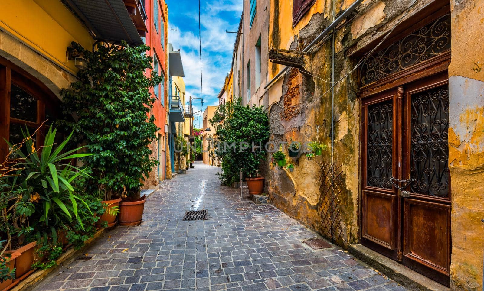 Charming streets of Greek islands, Crete. Street in the old town of Chania, Crete, Greece. Beautiful street in Chania, Crete island, Greece. Summer landscape. Travel and vacation.