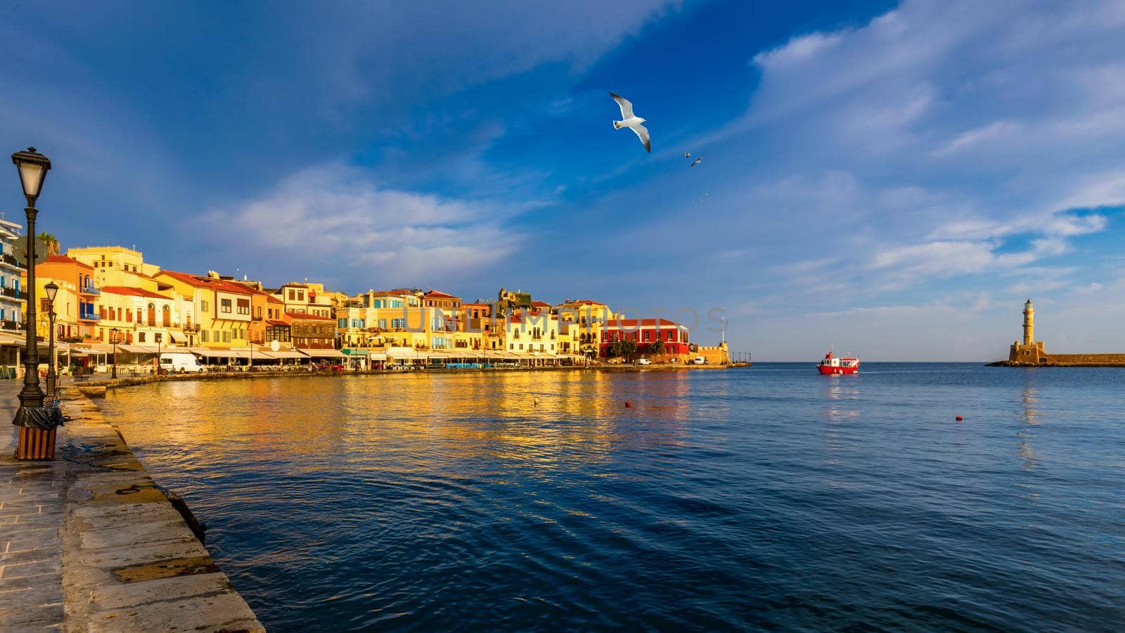 View of old port of Chania. Landmarks of Crete island. Greece. Bay of Chania at sunny summer day, Crete Greece. View of the old port of Chania, Crete, Greece. The port of chania, or Hania. 