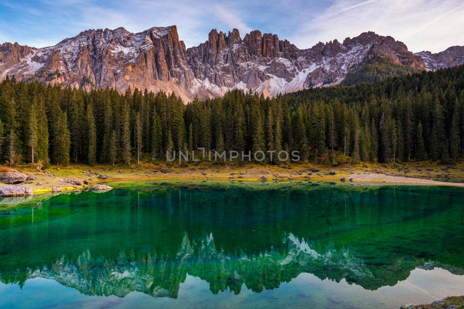 Carezza lake (Lago di Carezza, Karersee) with Mount Latemar, Bolzano province, South tyrol, Italy. Landscape of Lake Carezza or Karersee and Dolomites in background, Nova Levante, Bolzano, Italy.