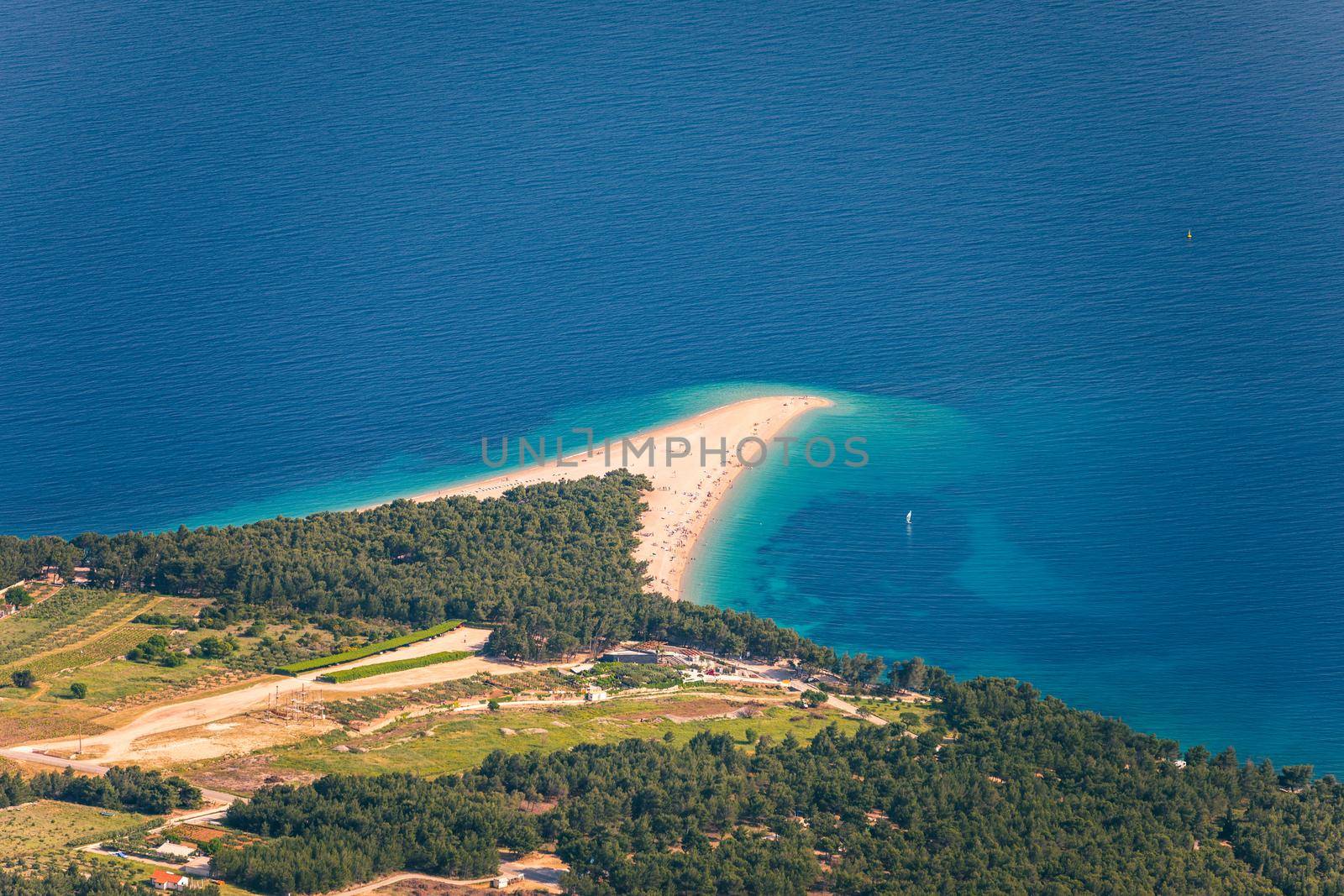 Beautiful panorama of famous Adriatic beach Zlatni Rat (Golden Cape or Golden Horn) with turquoise water , Island of Brac Croatia summertime. Famous Adriatic beach Zlatni Rat in Bol, Brac, Croatia.