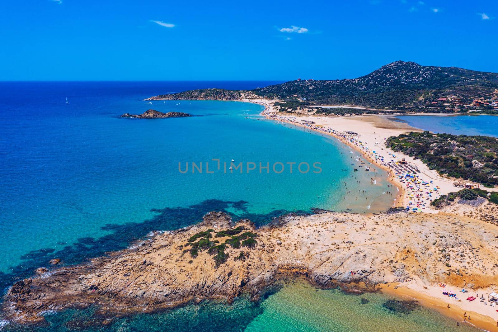 Panorama of the wonderful beaches of Chia, Sardinia, Italy. View of beautiful Chia bay and wonderful beaches, Sardinia island, Italy. Beautiful sea and bay on Su Guideu beach, Sardinia island, Italy