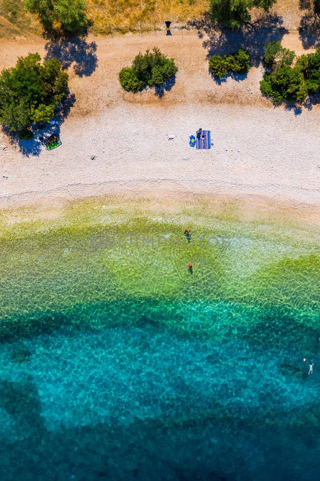 Beautiful crystal clear azure water at Antisamos beach on Kefalonia island, Greece. Beautiful sea bay with Antisamos beach on Kefalonia island, Ionian island, Cephalonia, Antisamos beach, Greece. 