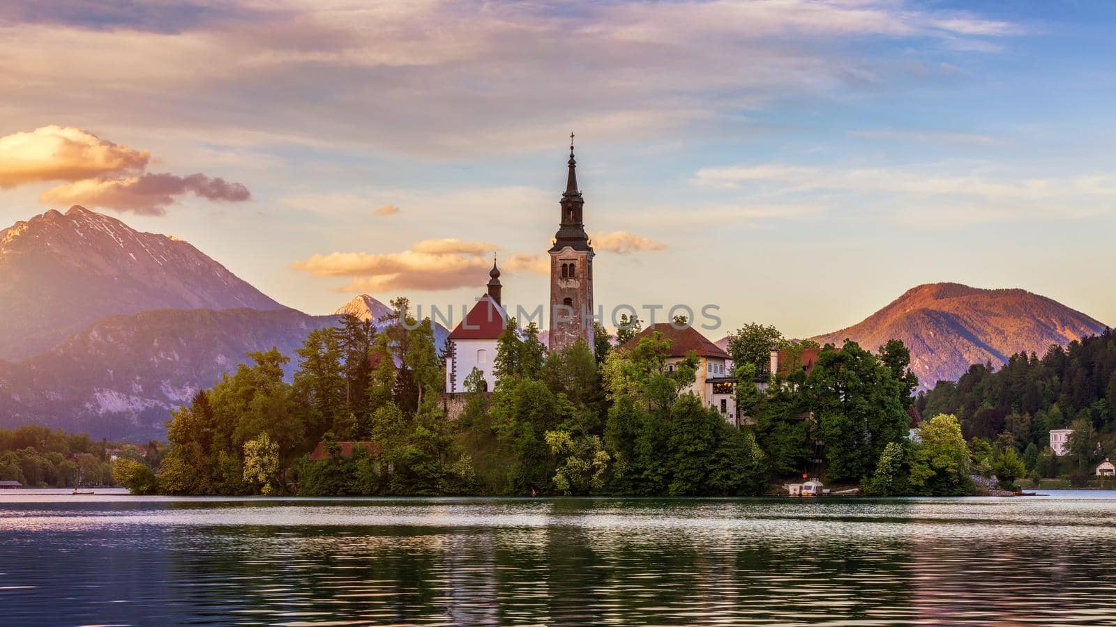 Lake Bled Slovenia. Beautiful mountain lake with small Pilgrimage Church. Most famous Slovenian lake and island Bled with Pilgrimage Church of the Assumption of Maria. Bled, Slovenia, Europe. 