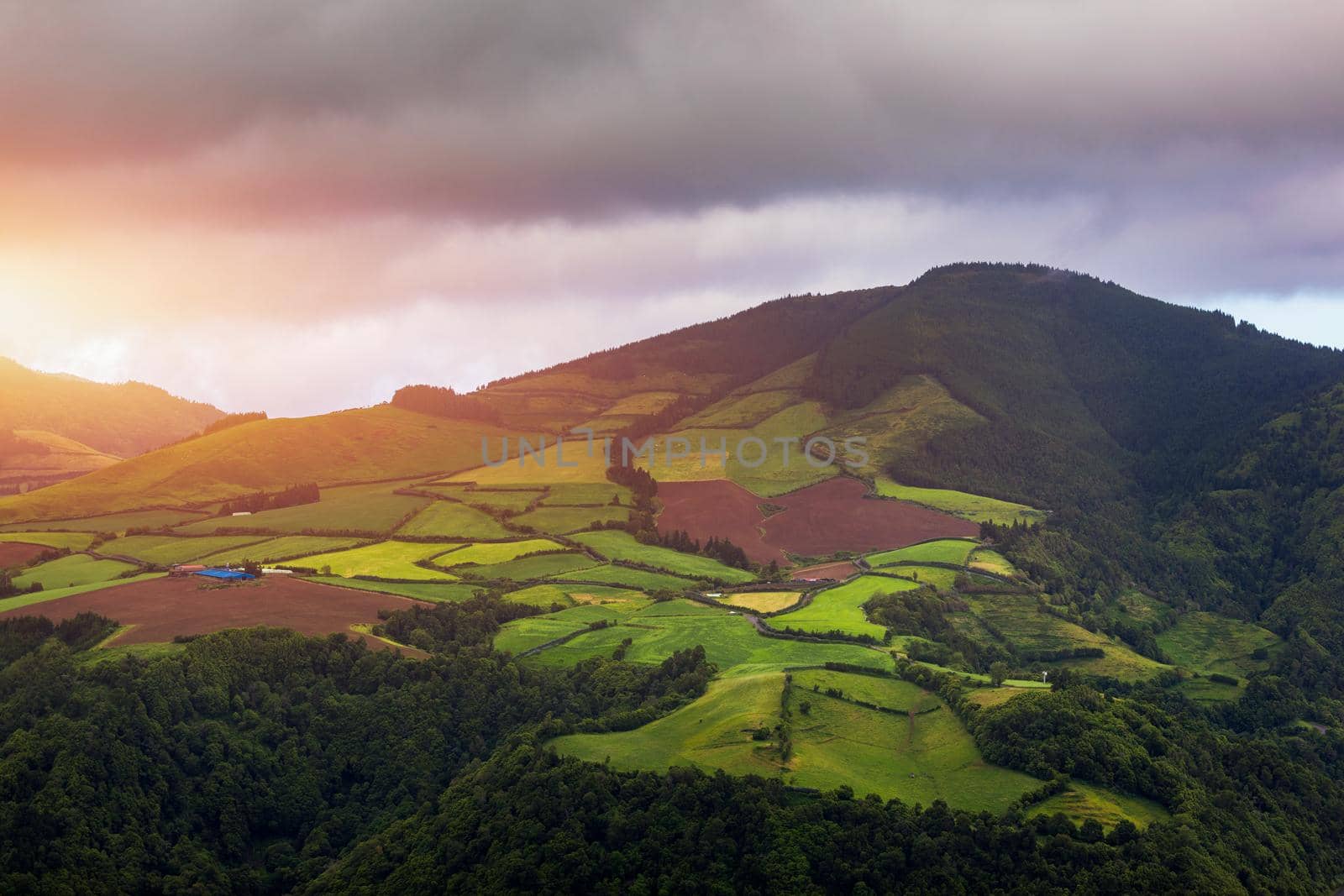 Azores panoramic view of natural landscape, wonderful scenic island of Portugal. Beautiful lagoons in volcanic craters and green fields. Tourist attraction and travel destination. Azores, Portugal.