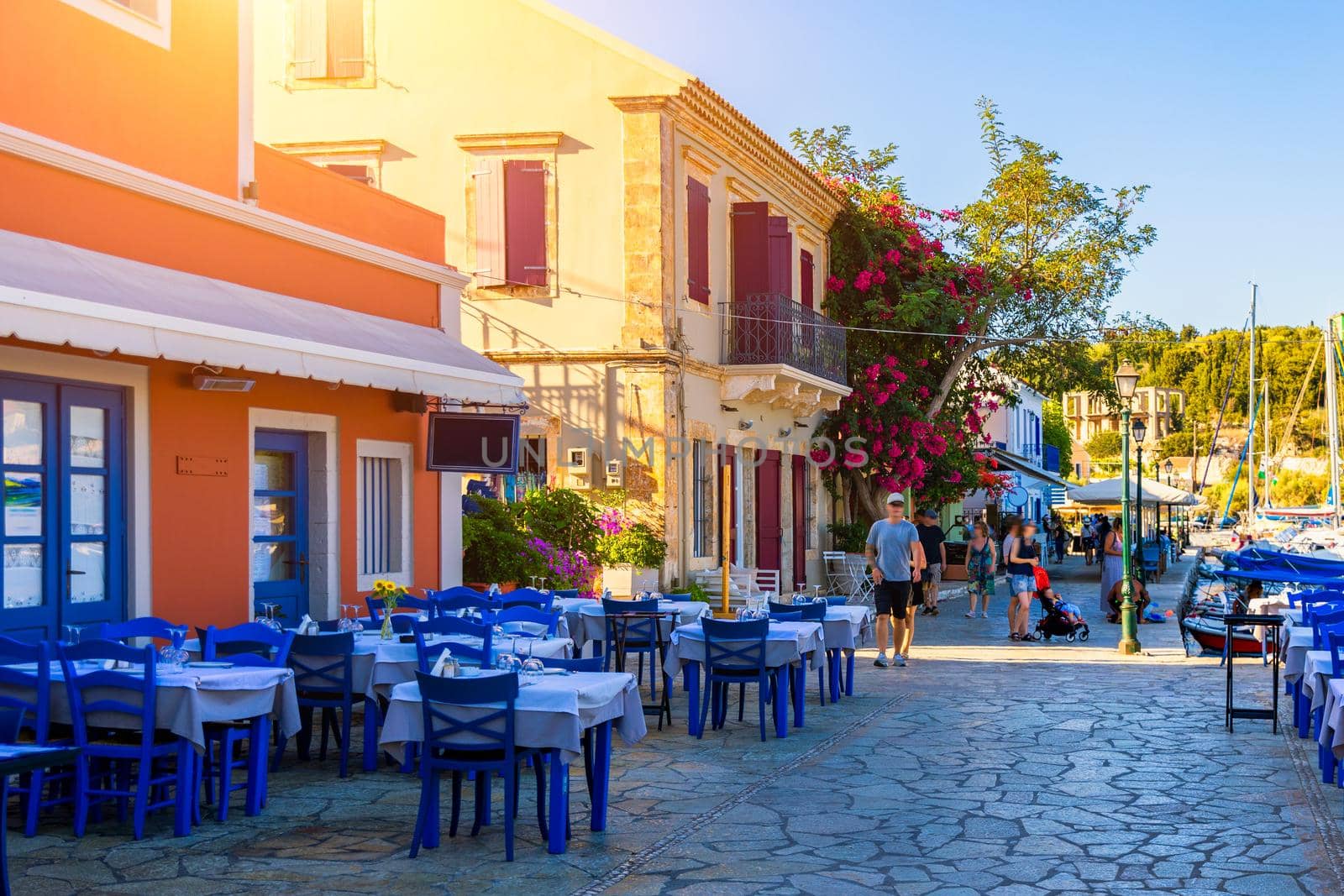 Fiskardo village, Kefalonia island, Greece. Fiscardo on the Island of Kefalonia in Greece. The holiday destination. Beautiful narrow streets in Fiskardo, Kefalonia, Greece