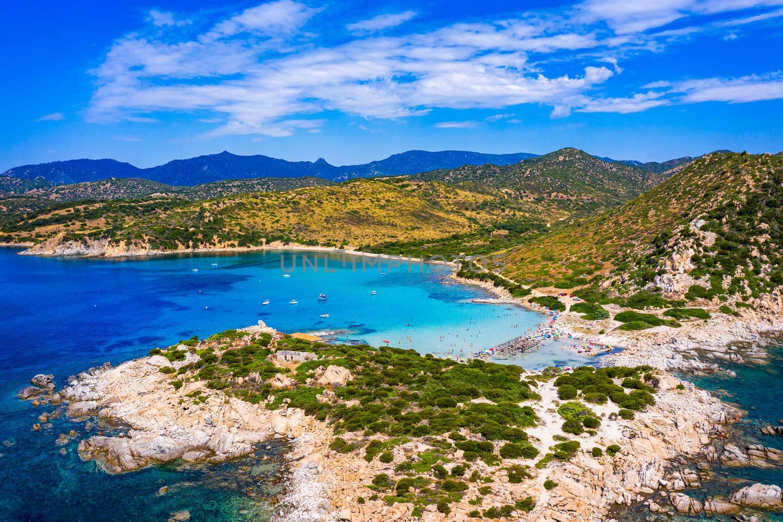 Cost of Sardinia: Peninsula of Punta Molentis. View of beautiful beach at Punta Molentis, Villasimius, Sardinia, Italy. Beautiful bay with sandy beach at Punta Molentis, Sardinia island, Italy.