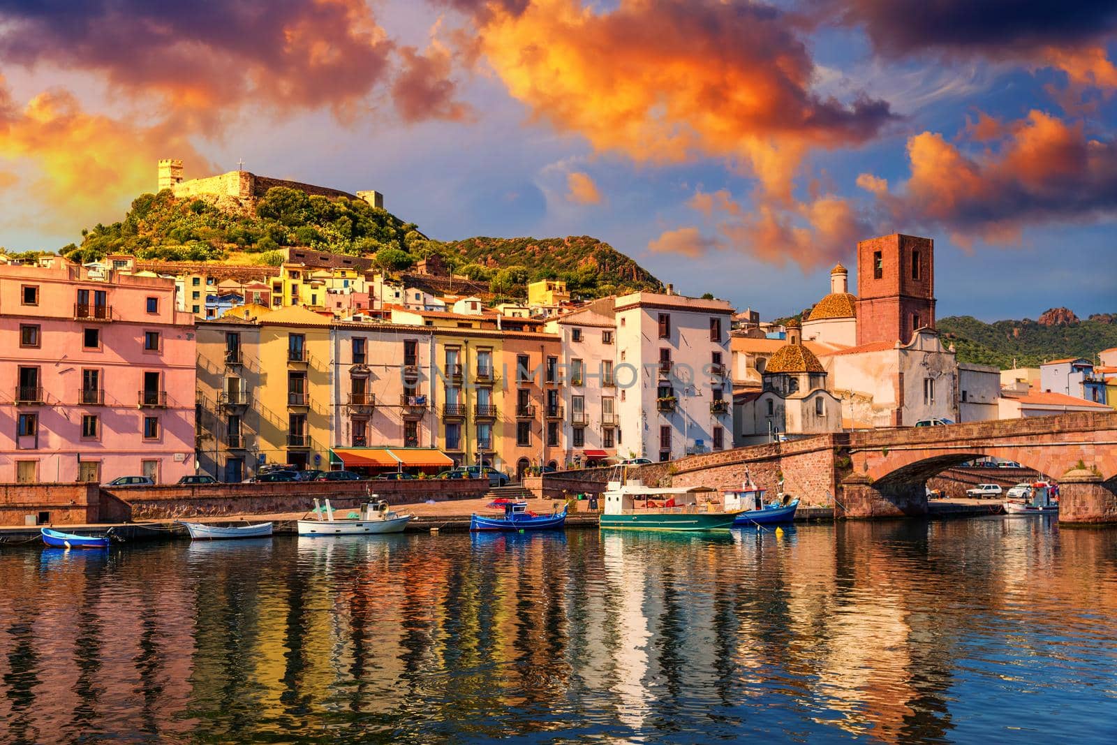 Beautiful view of Bosa town, Sardinia island, Italy. Travel destination. Bosa town with Ponte Vecchio bridge across the Temo river. Marvelous morning view of Sardinia island, Italy, Europe.