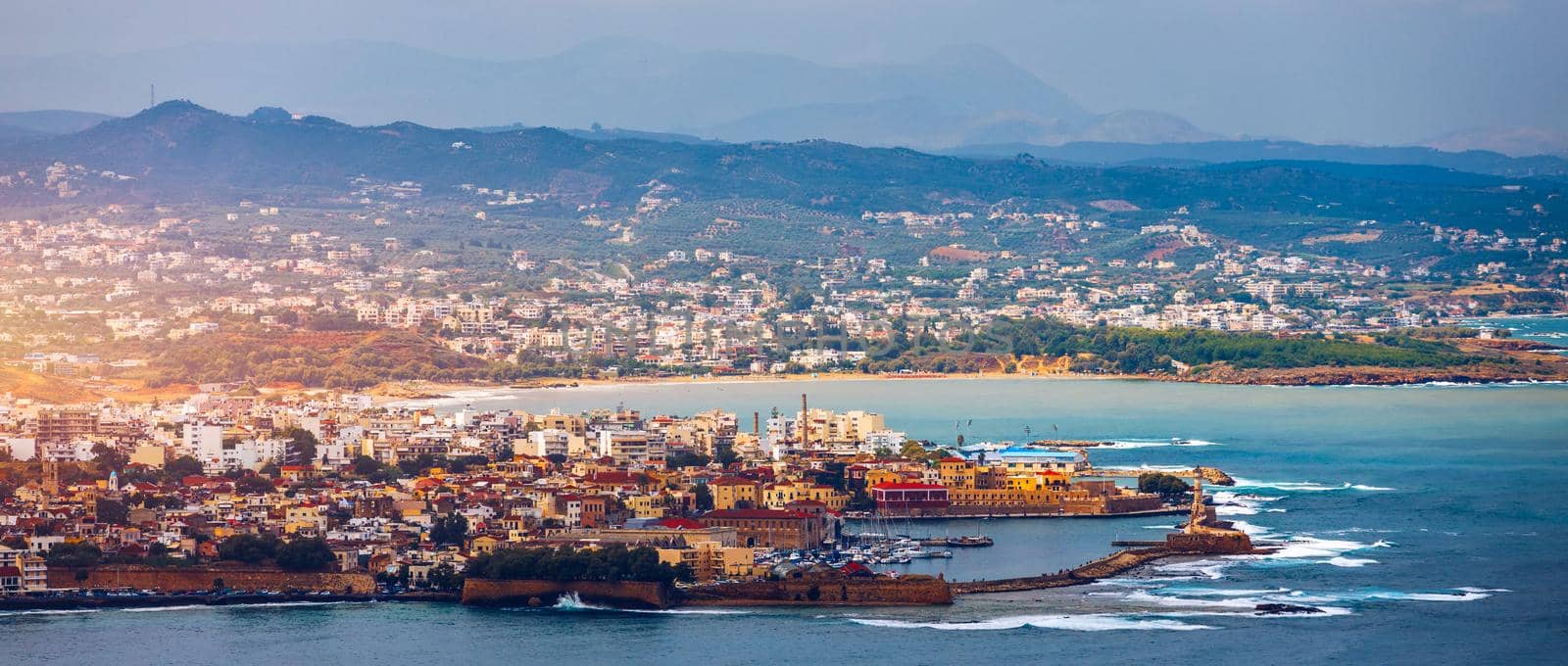 Picturesque old port of Chania. Landmarks of Crete island. Greece. Bay of Chania at sunny summer day, Crete Greece. View of the old port of Chania, Crete, Greece. The port of chania, or Hania. 