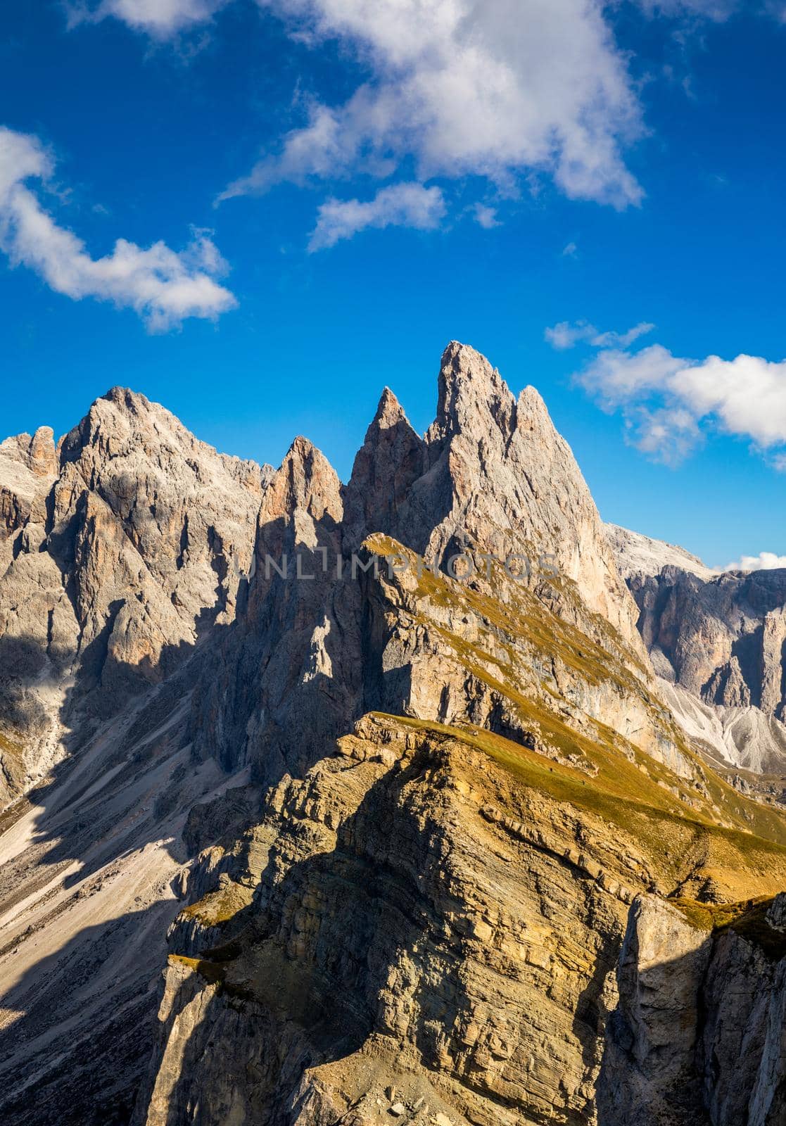 View on Seceda peak. Trentino Alto Adige, Dolomites Alps, South Tyrol, Italy. Odle mountain range, Val Gardena. Majestic Furchetta peak. Odles group seen from Seceda, Santa Cristina Val Gardena.