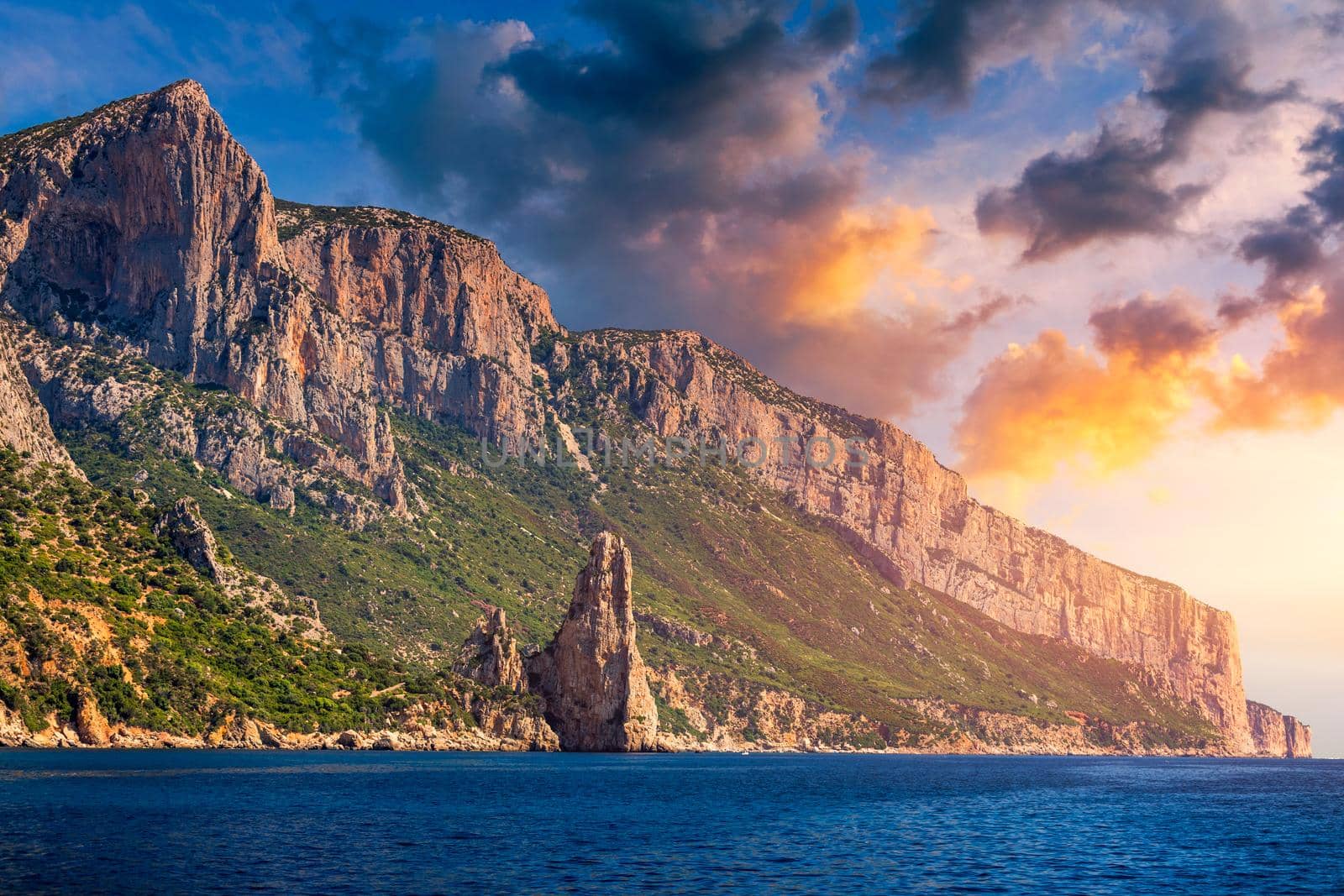 The monolith of Pedra Longa, Baunei, province of Ogliastra, East Sardinia, Italy. The rocky spire which rises majestically out of the sea. Holidays in Sardinia, Italy.