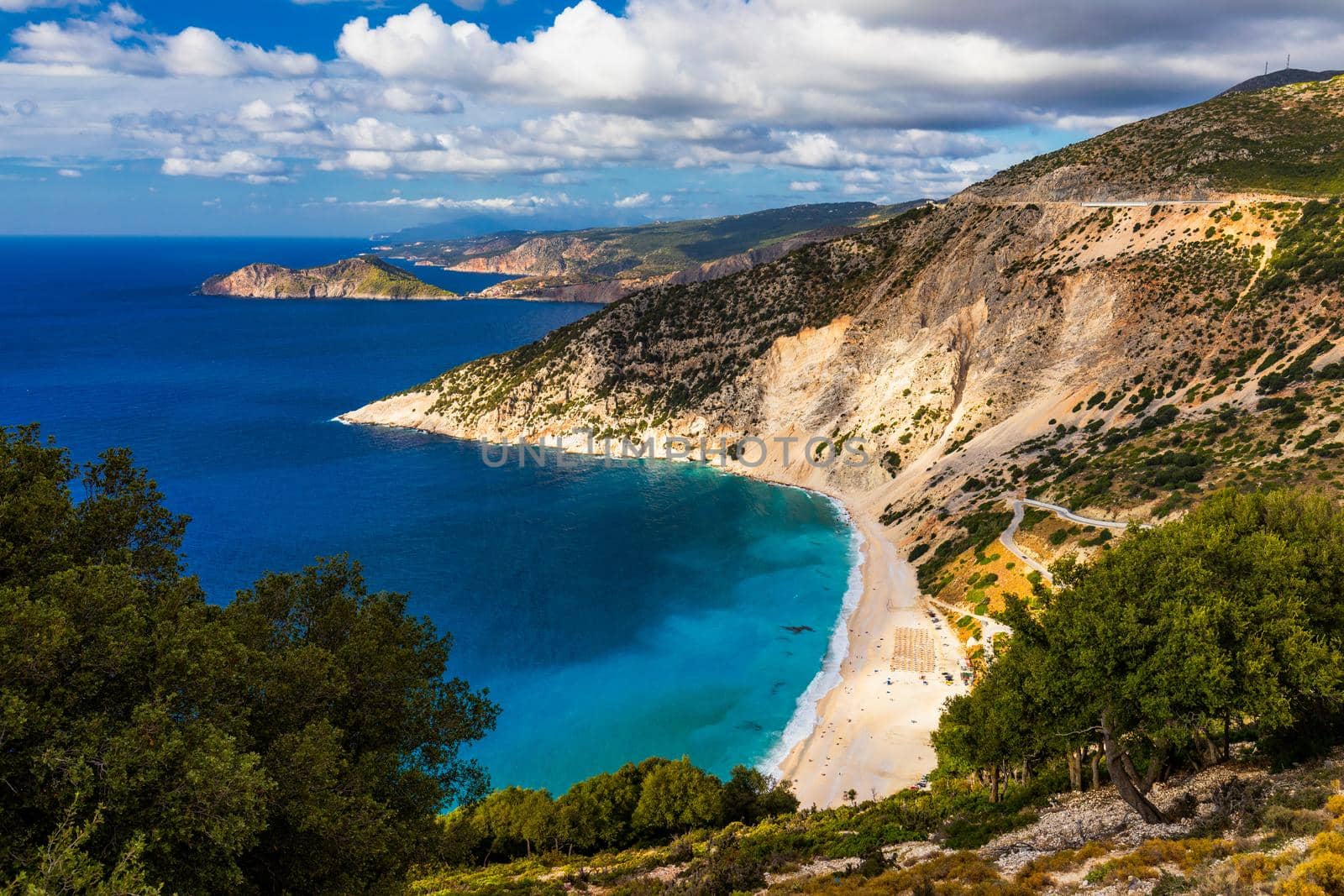 Famous Myrtos beach from overlook, Kefalonia (Cephalonia), Greece. Myrtos beach, Kefalonia island, Greece. Beautiful view of Myrtos beach, Ionian Island, Kefalonia (Cephalonia), Greece.