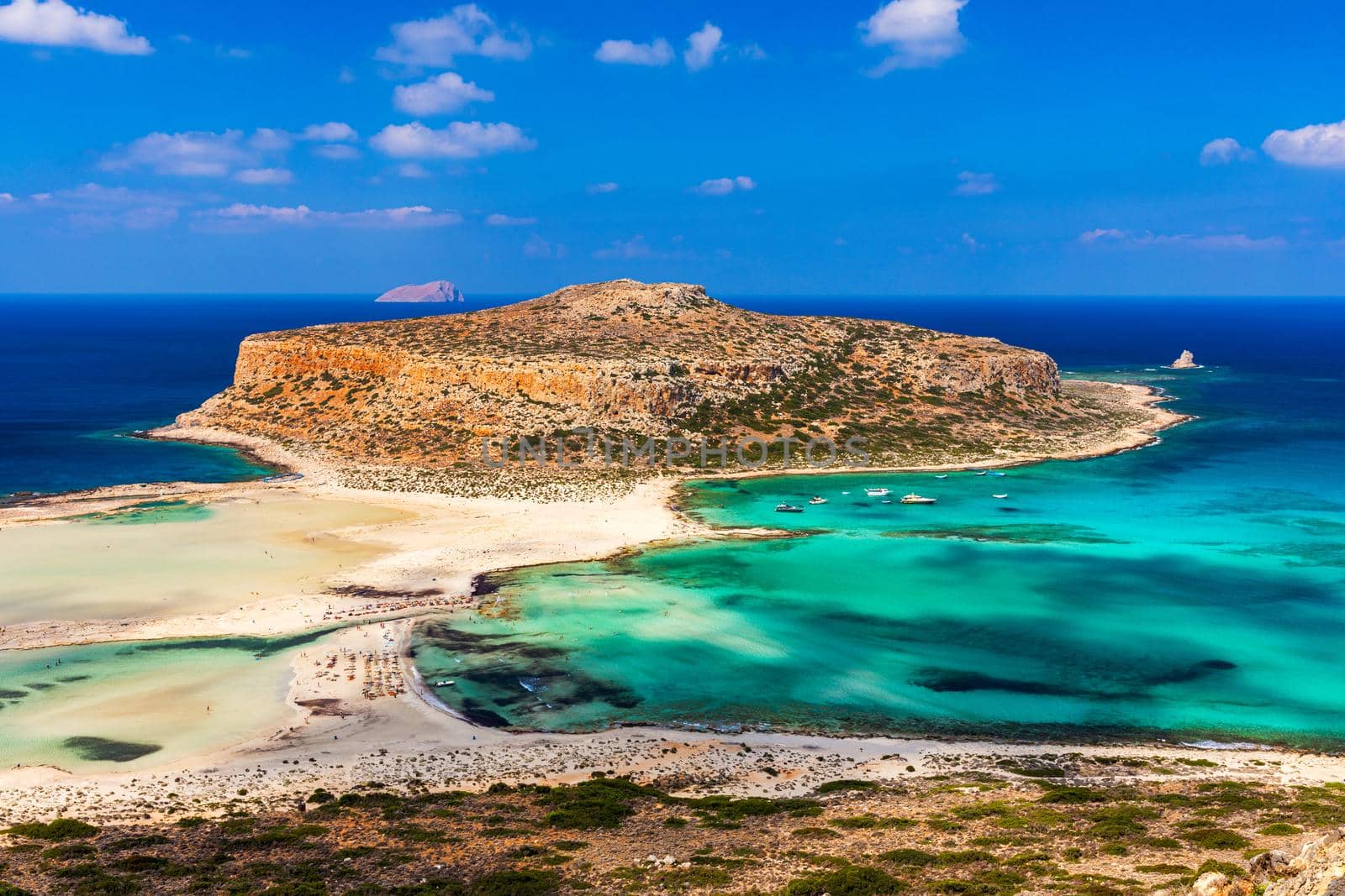 Amazing beach with turquoise water at Balos Lagoon and Gramvousa in Crete, Greece. Cap tigani in the center. Balos beach on Crete island, Greece. Landscape of Balos beach at Crete island in Greece.