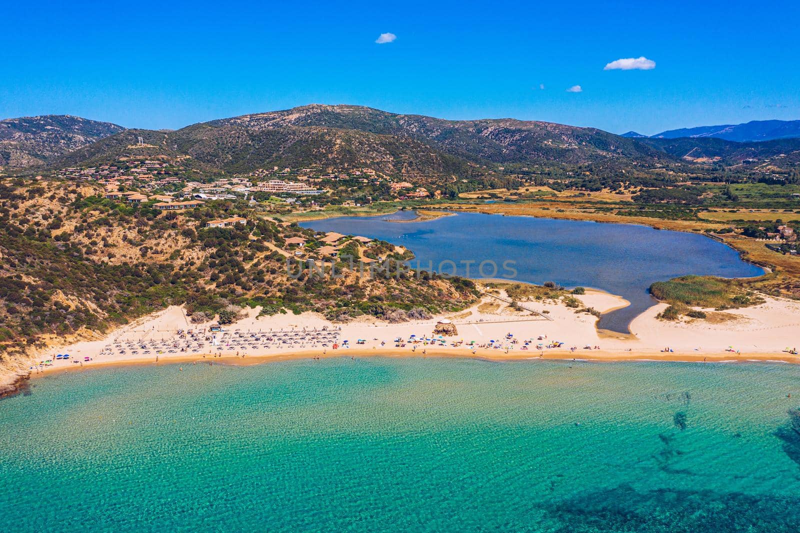 Panorama of the wonderful beaches of Chia, Sardinia, Italy. View of beautiful Chia bay and wonderful beaches, Sardinia island, Italy. Beautiful sea and bay on Su Guideu beach, Sardinia island, Italy