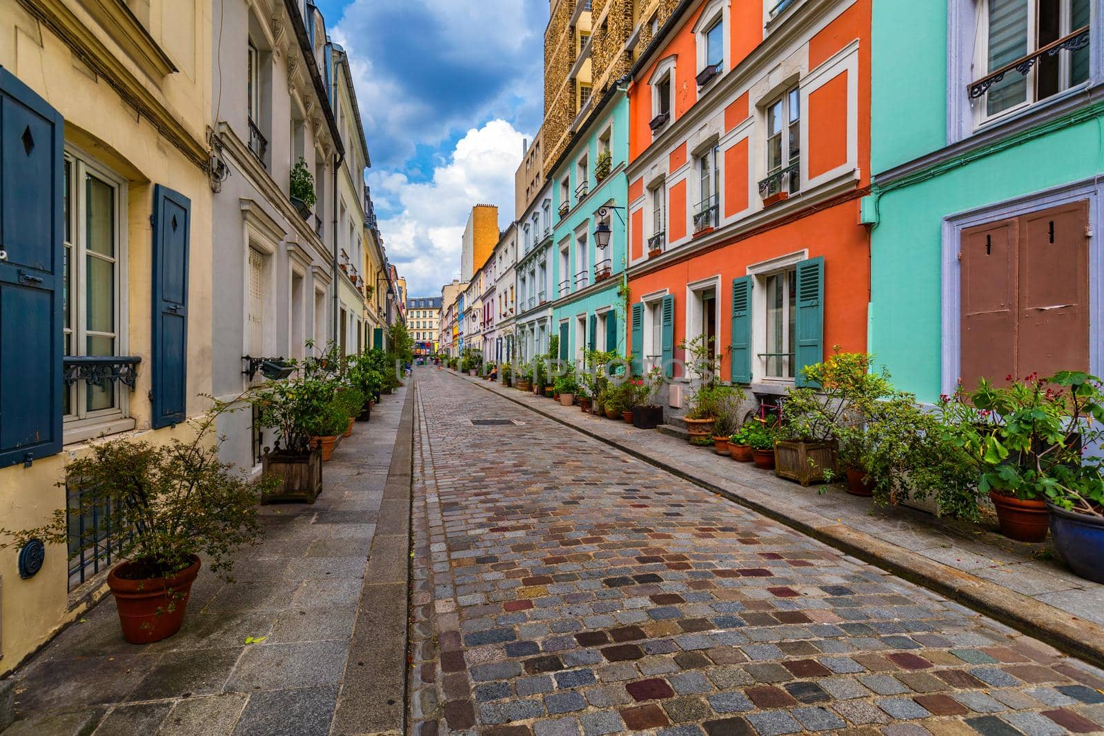 Cremieux Street (Rue Cremieux), Paris, France. Rue Cremieux in the 12th Arrondissement is one of the prettiest residential streets in Paris. Colored houses in Rue Cremieux street in Paris. France.
