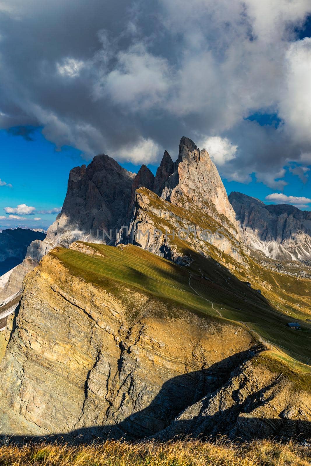 View on Seceda peak. Trentino Alto Adige, Dolomites Alps, South Tyrol, Italy. Odle mountain range, Val Gardena. Majestic Furchetta peak. Odles group seen from Seceda, Santa Cristina Val Gardena.