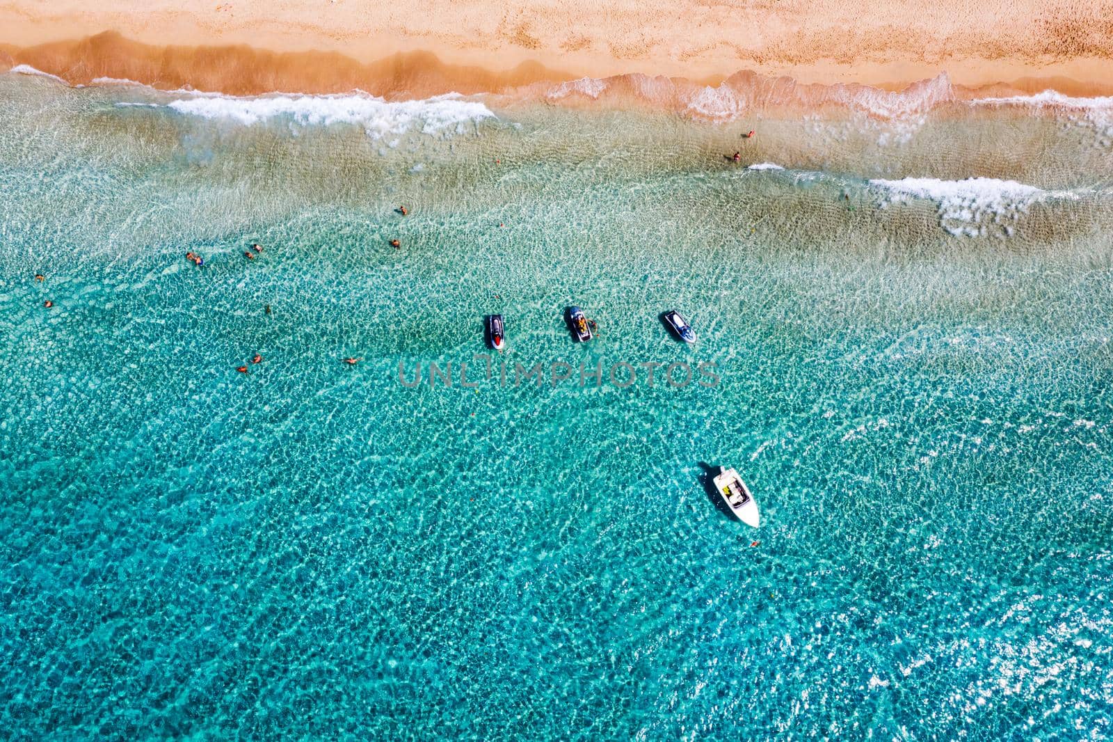 Aerial shot of beautiful turquoise beach Falasarna (Falassarna) in Crete, Greece. View of famous paradise sandy deep turquoise beach of Falasarna (Falassarna) in North West, Crete island, Greece.