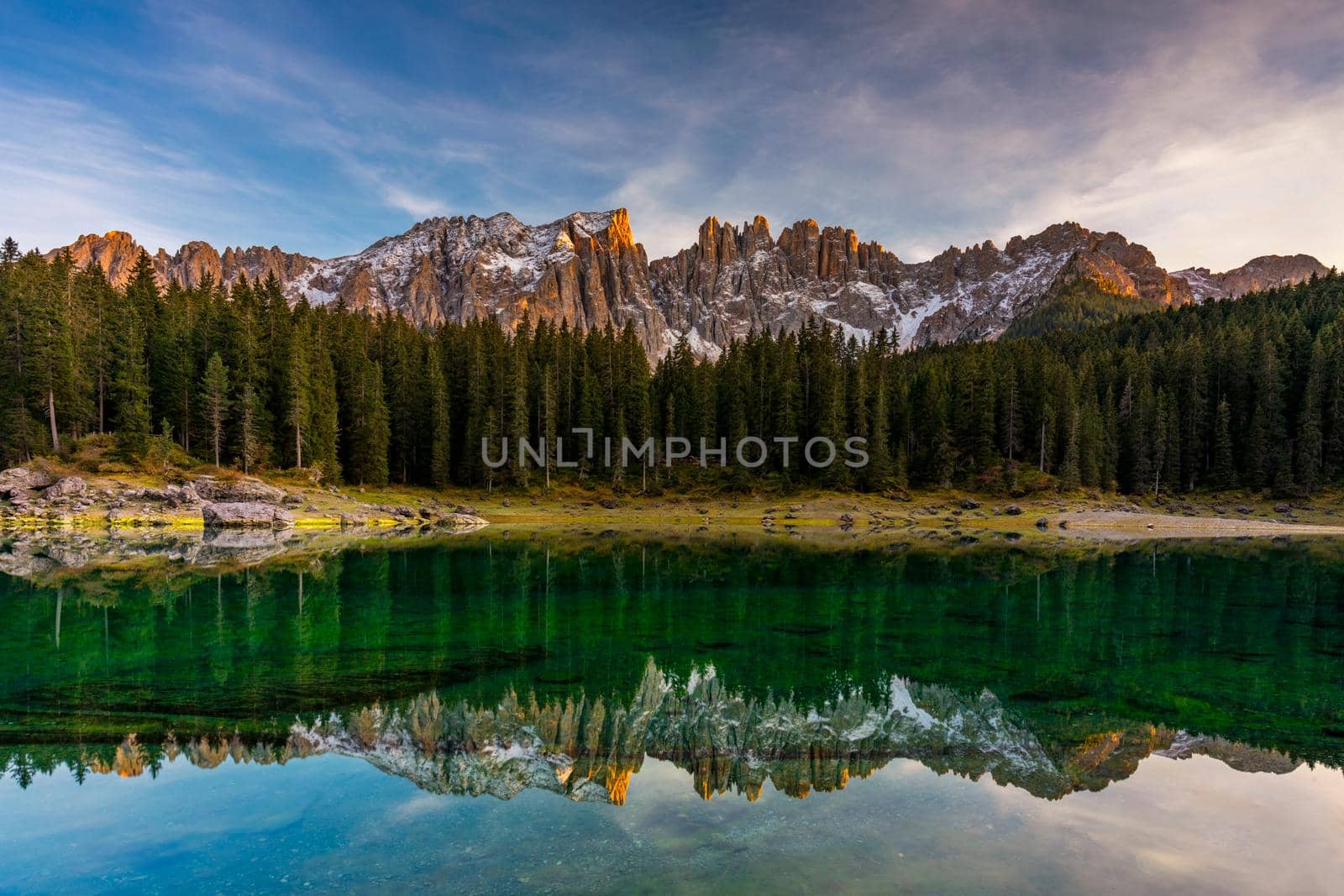 Carezza lake (Lago di Carezza, Karersee) with Mount Latemar, Bolzano province, South tyrol, Italy. Landscape of Lake Carezza or Karersee and Dolomites in background, Nova Levante, Bolzano, Italy.