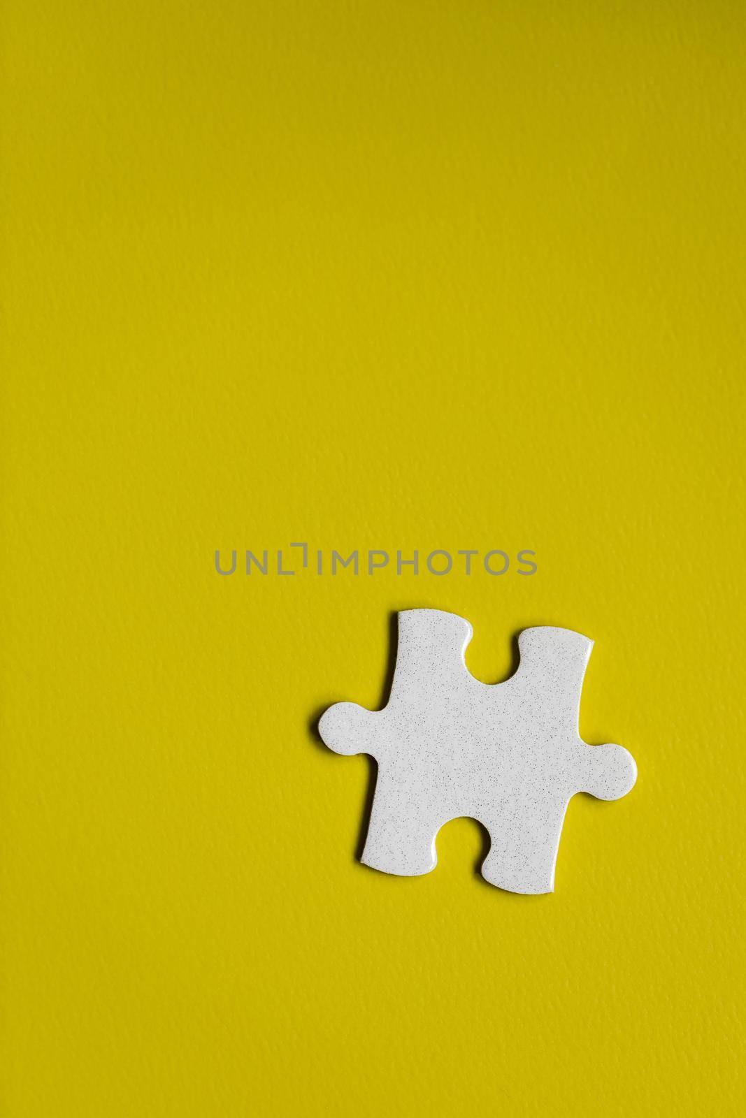 Closeup of jigsaw puzzle isolated. Missing jigsaw puzzle piece, business concept for completing the puzzle piece. Group of puzzle and a puzzle piece. Teamwork concept. Think difference concept. 