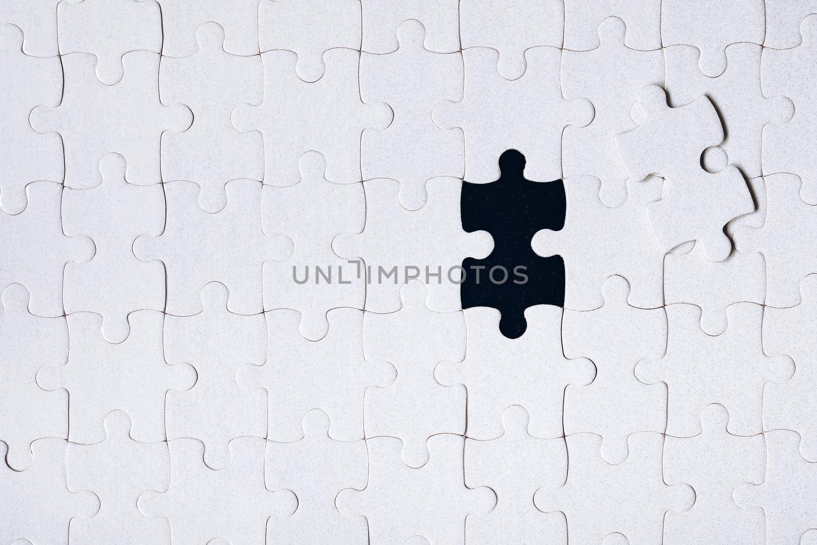 Jigsaw puzzle with missing piece. Missing puzzle pieces. Concept image of unfinished task. Completing final task, missing jigsaw puzzle pieces and business concept with a puzzle piece missing.