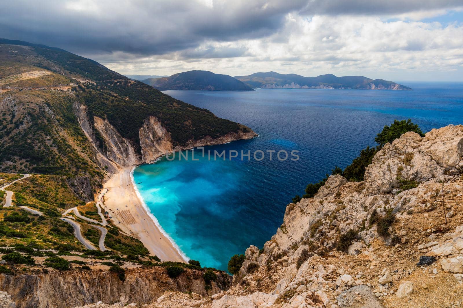 Famous Myrtos beach from overlook, Kefalonia (Cephalonia), Greece. Myrtos beach, Kefalonia island, Greece. Beautiful view of Myrtos beach, Ionian Island, Kefalonia (Cephalonia), Greece.