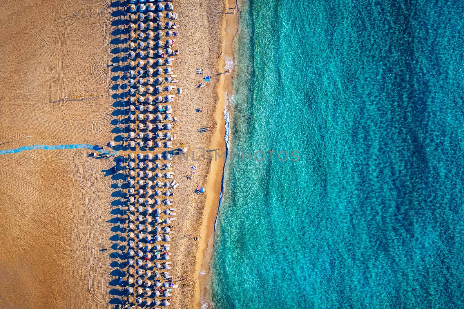 Aerial shot of beautiful turquoise beach Falasarna (Falassarna) in Crete, Greece. View of famous paradise sandy deep turquoise beach of Falasarna (Falassarna) in North West, Crete island, Greece.