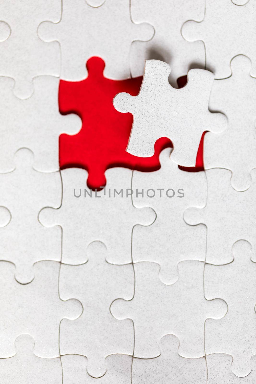 Jigsaw puzzle with missing piece. Missing puzzle pieces. Concept image of unfinished task. Completing final task, missing jigsaw puzzle pieces and business concept with a puzzle piece missing.