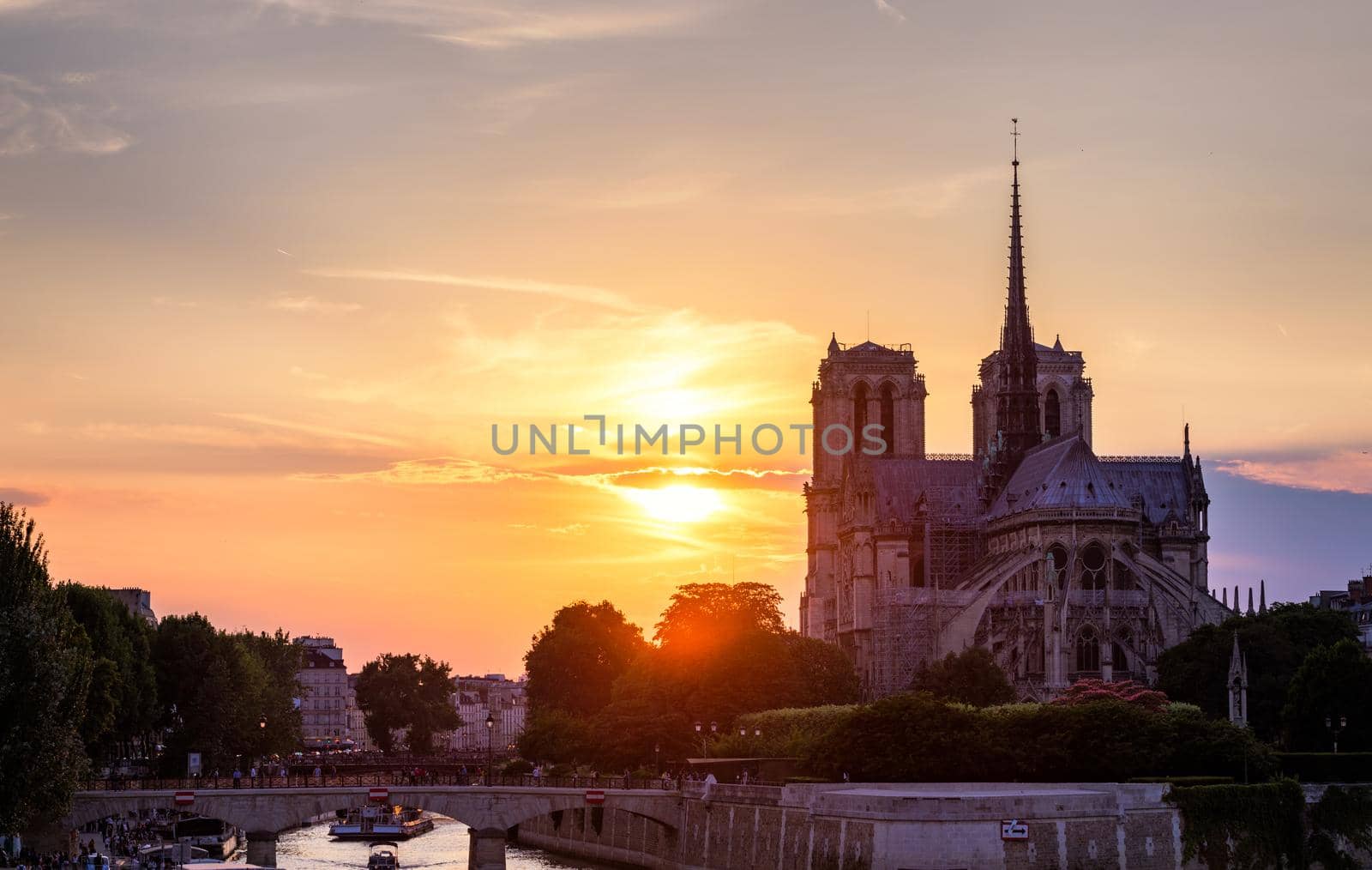 Notre Dame de Paris cathedral, France. Notre Dame de Paris Cathedral, most beautiful Cathedral in Paris. Picturesque sunset over Cathedral of Notre Dame de Paris, destroyed in a fire in 2019, Paris.