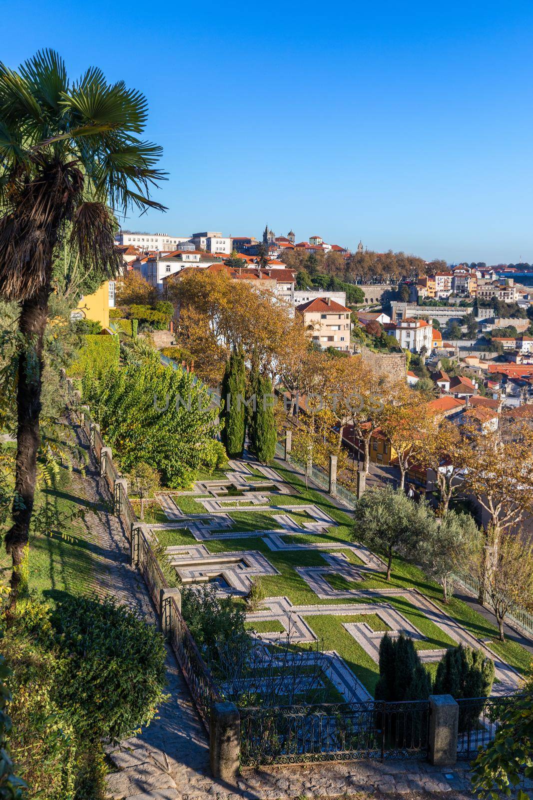 Ancient city of Porto with old multi-colored houses with red roof tiles. Portugal, Porto