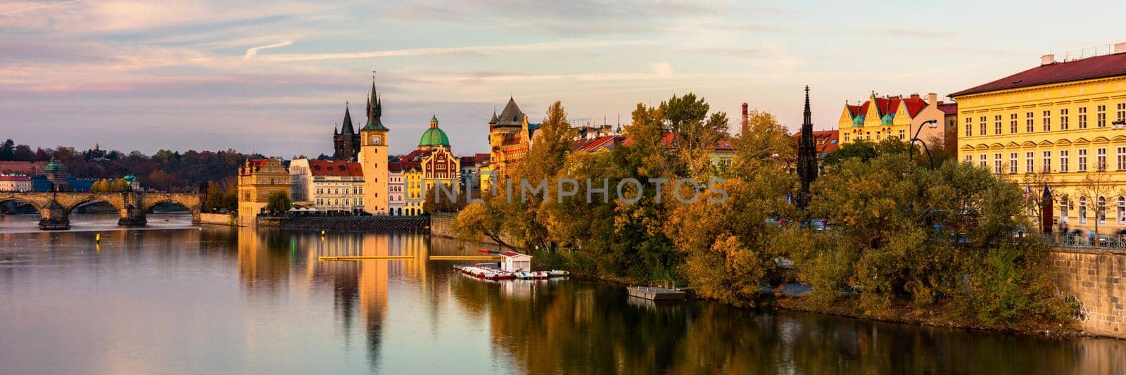 Charles Bridge in Prague in Czechia. Prague, Czech Republic. Charles Bridge (Karluv Most) and Old Town Tower. Vltava River and Charles Bridge. Concept of world travel, sightseeing and tourism.