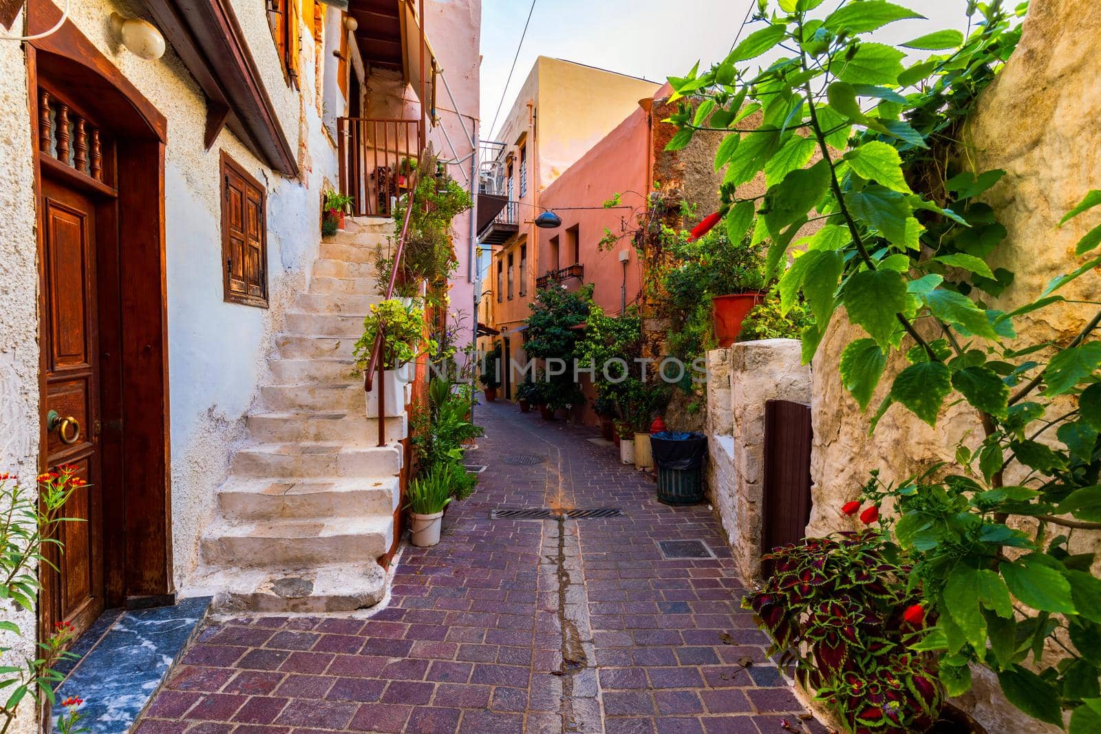 Charming streets of Greek islands, Crete. Street in the old town of Chania, Crete, Greece. Beautiful street in Chania, Crete island, Greece. Summer landscape. Travel and vacation.