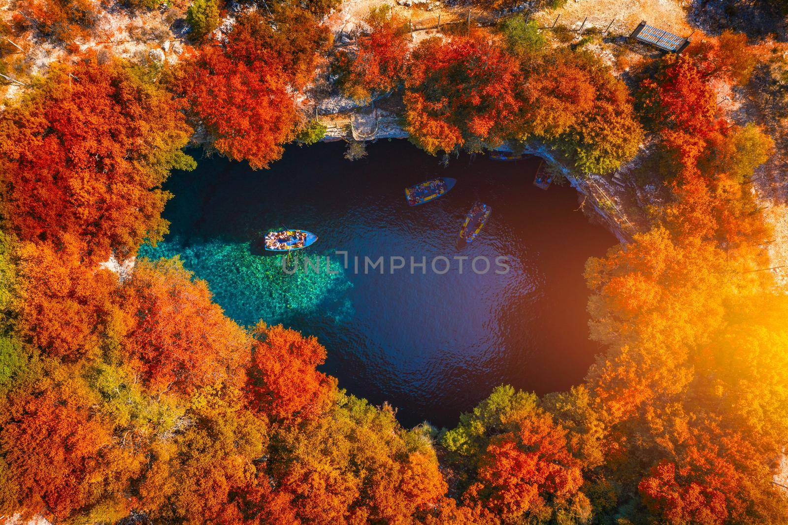 Melissani Cave with autumn colors. Famous Melissani lake on Kefalonia island, Karavomylos, Greece. On top of Melissani Cave (Melissani Lake) in Karavomylos village in Kefalonia island , Greece. 