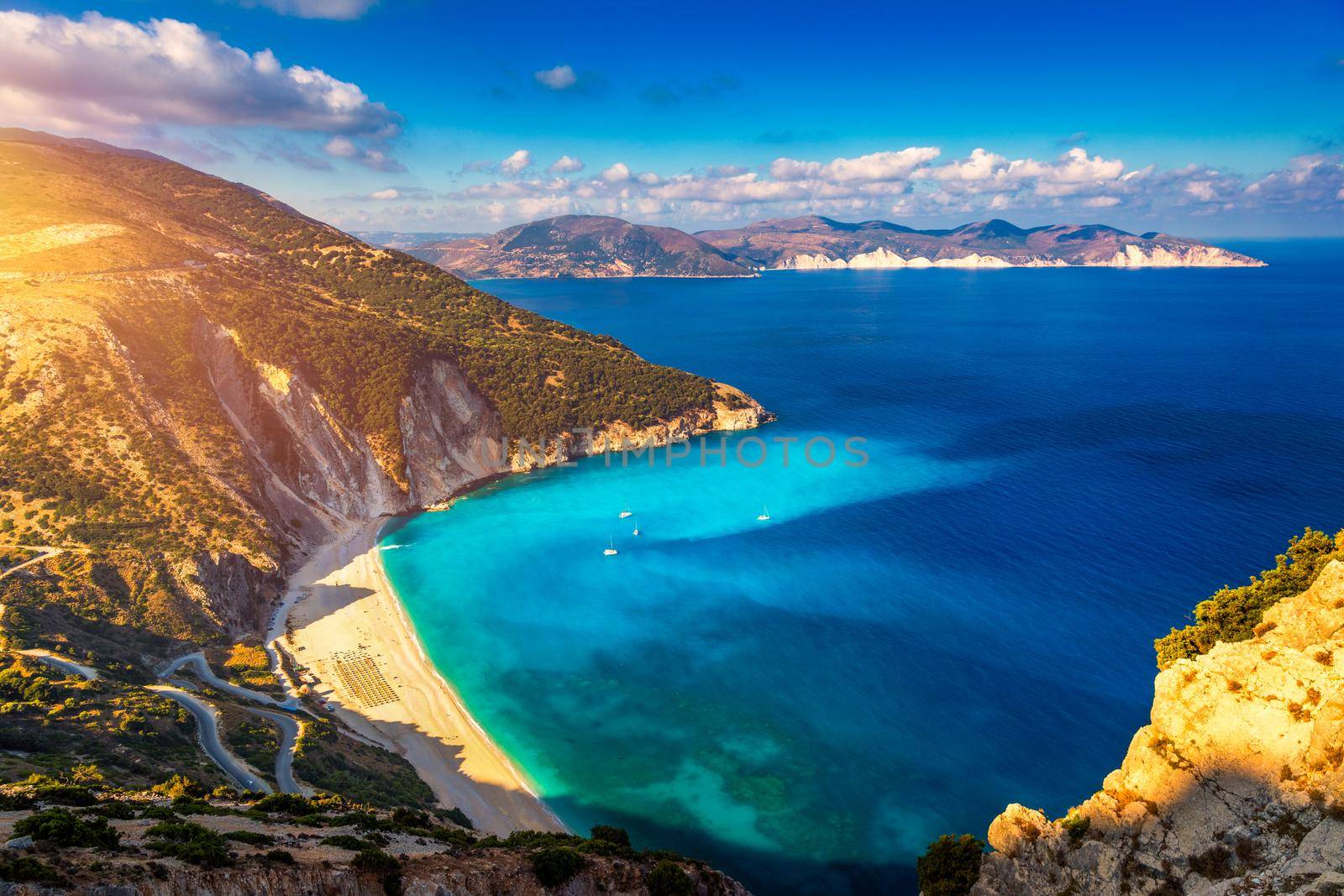 Aerial drone view of iconic turquoise and sapphire bay and beach of Myrtos, Kefalonia (Cephalonia) island, Ionian, Greece. Myrtos beach, Kefalonia island, Greece. Beautiful view of Myrtos beach.