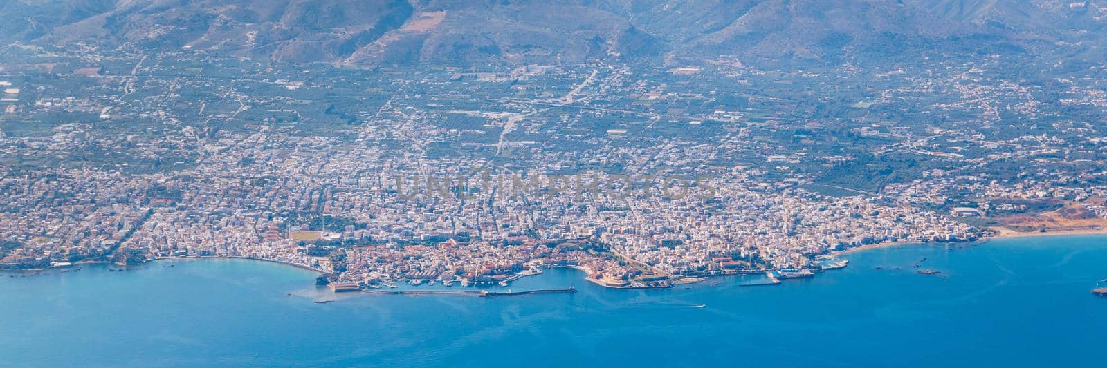 Crete island. Beautiful view of the Crete island Greece from the plane. Holiday, relaxation, sea. Crete view from plane. Greek Island. Seaside of Crete island, aerial view, Greece.