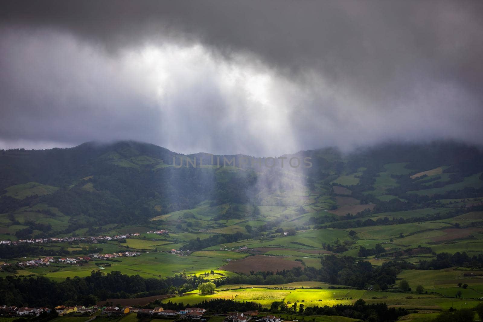 Azores panoramic view of natural landscape, wonderful scenic island of Portugal. Beautiful lagoons in volcanic craters and green fields. Tourist attraction and travel destination. Azores, Portugal.
