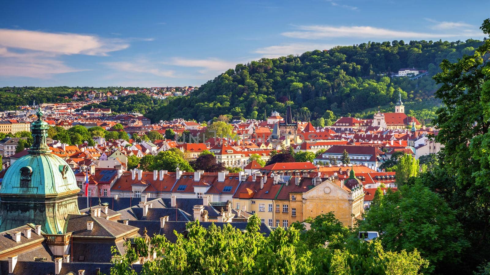 View of the Vltava River and the bridges shined with the sunset sun, Prague, the Czech Republic