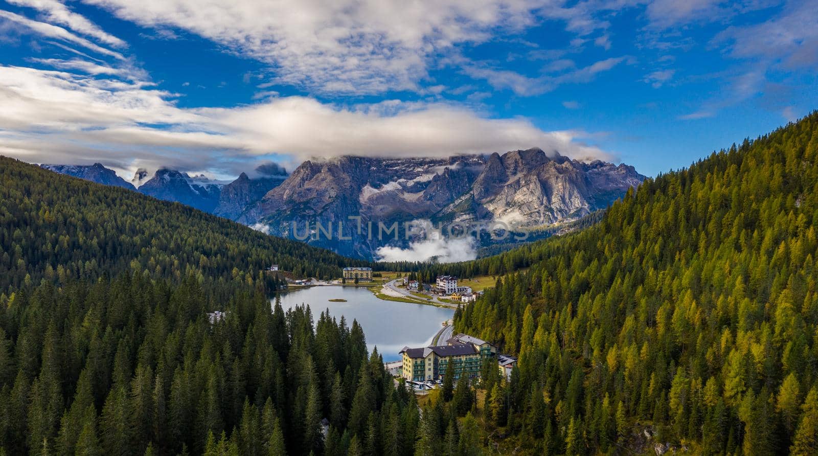 Lake Misurina or Lago di Misurina Italy. Misurina Lake with perfect sky reflection in calm water. Stunning view on the majestic Dolomites Alp Mountains, Italy, National Park Tre Cime di Lavaredo.