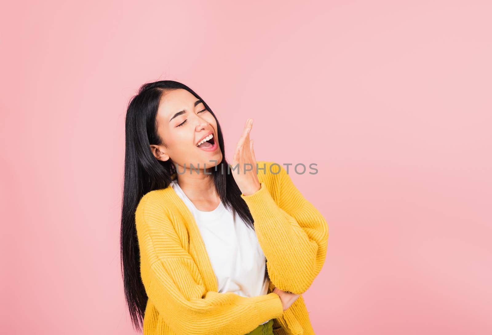 woman standing winning and surprised excited screaming laugh by Sorapop