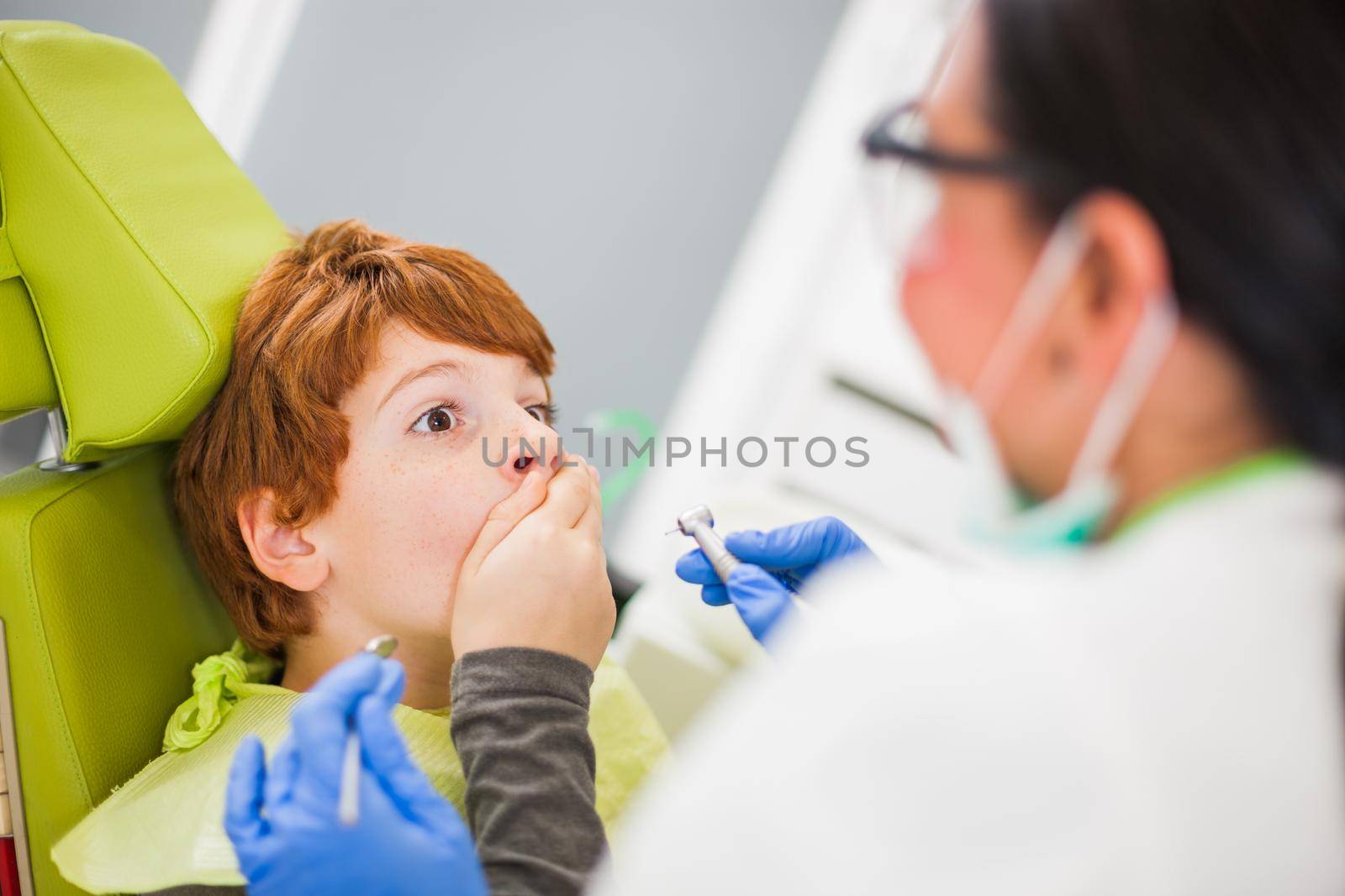 Little boy is afraid of dentist.