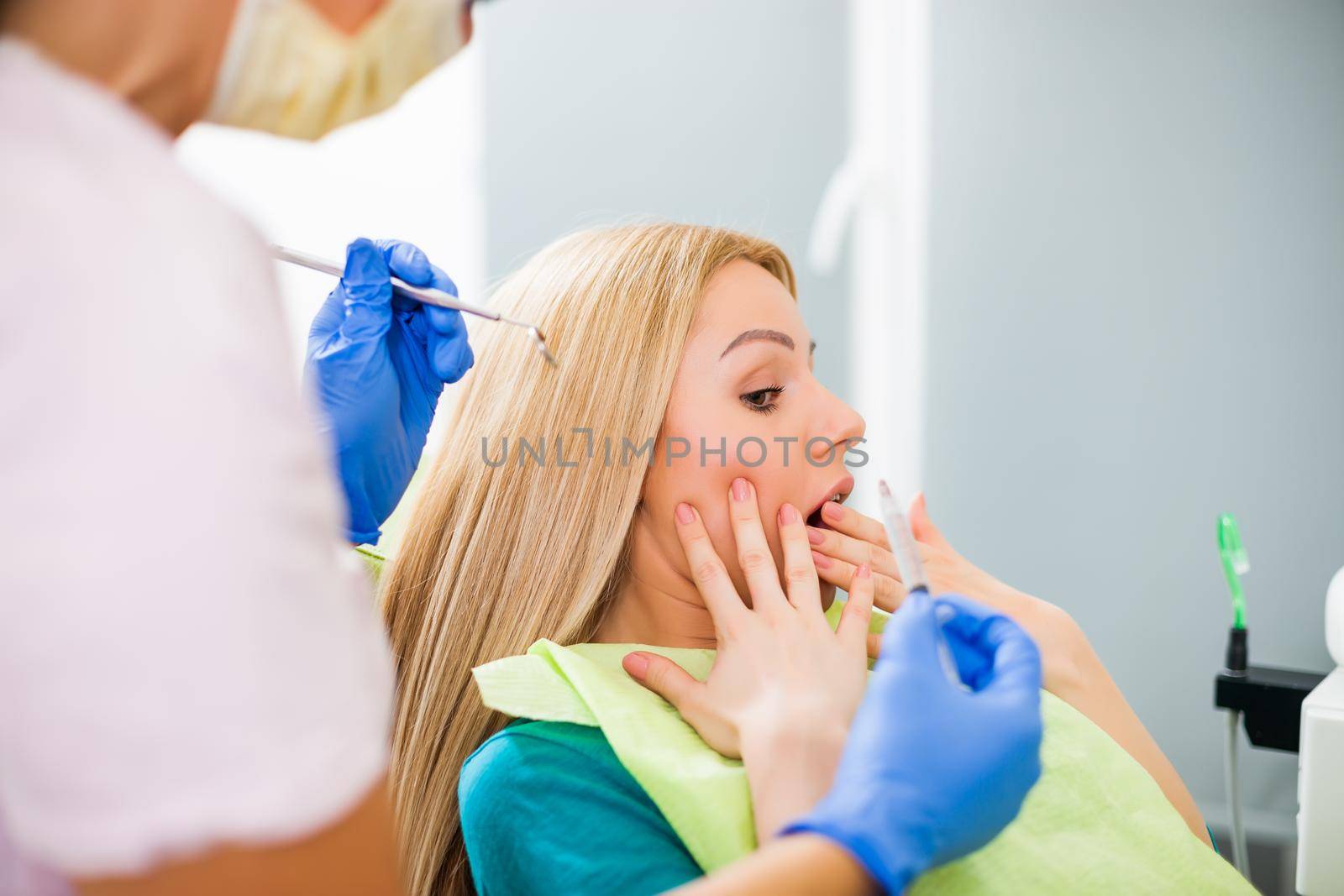 Woman at dentist by djoronimo