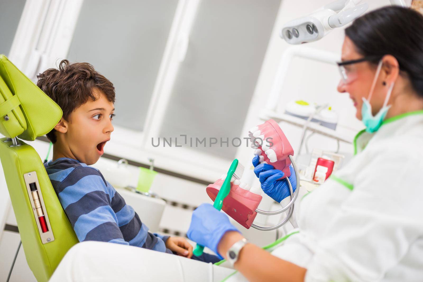 Little boy doesn't want to clean his teeth.