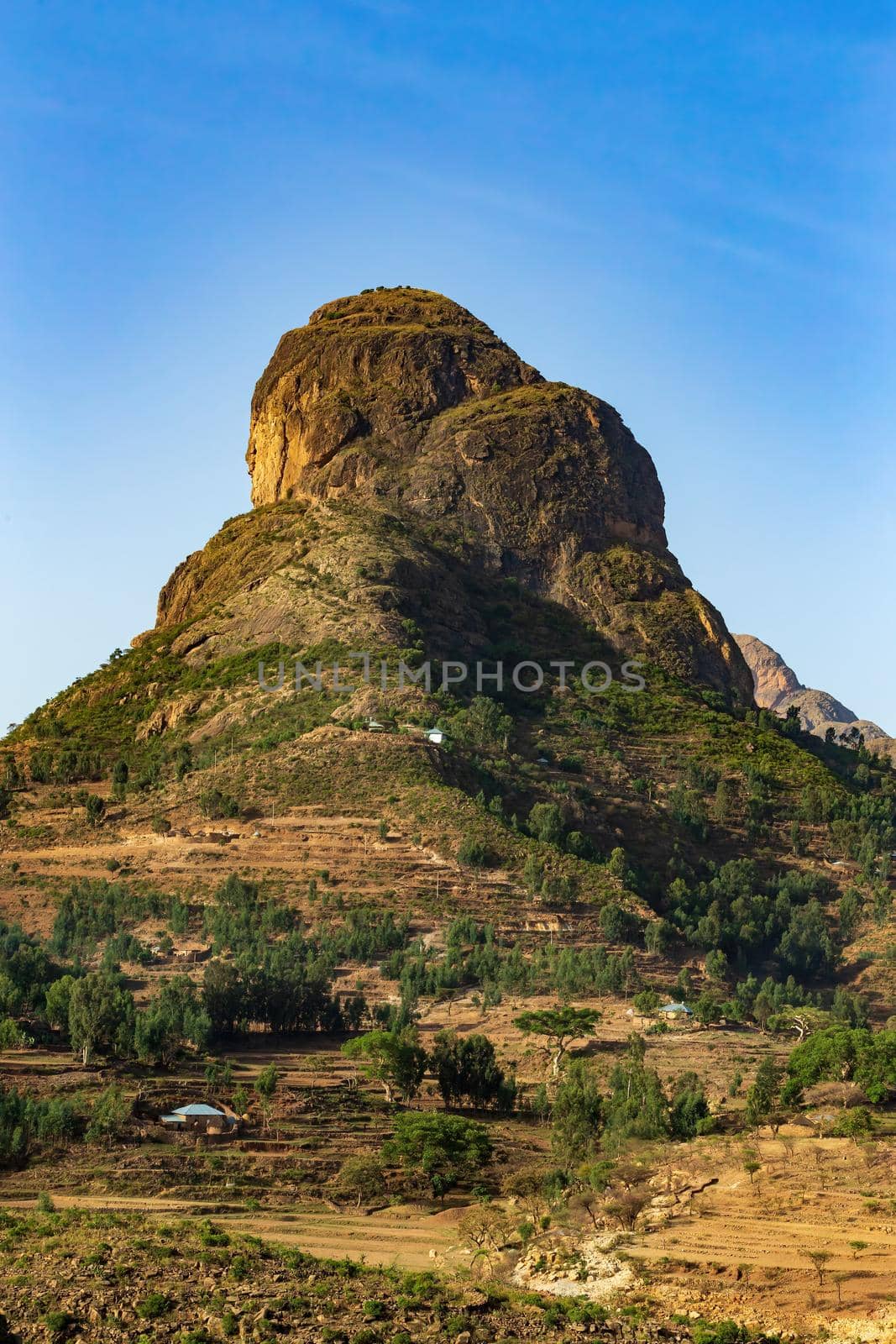 Beautiful mountain landscape with traditional ethiopian houses in valley. Amhara region near city Lalibela. Ethiopia, Africa.