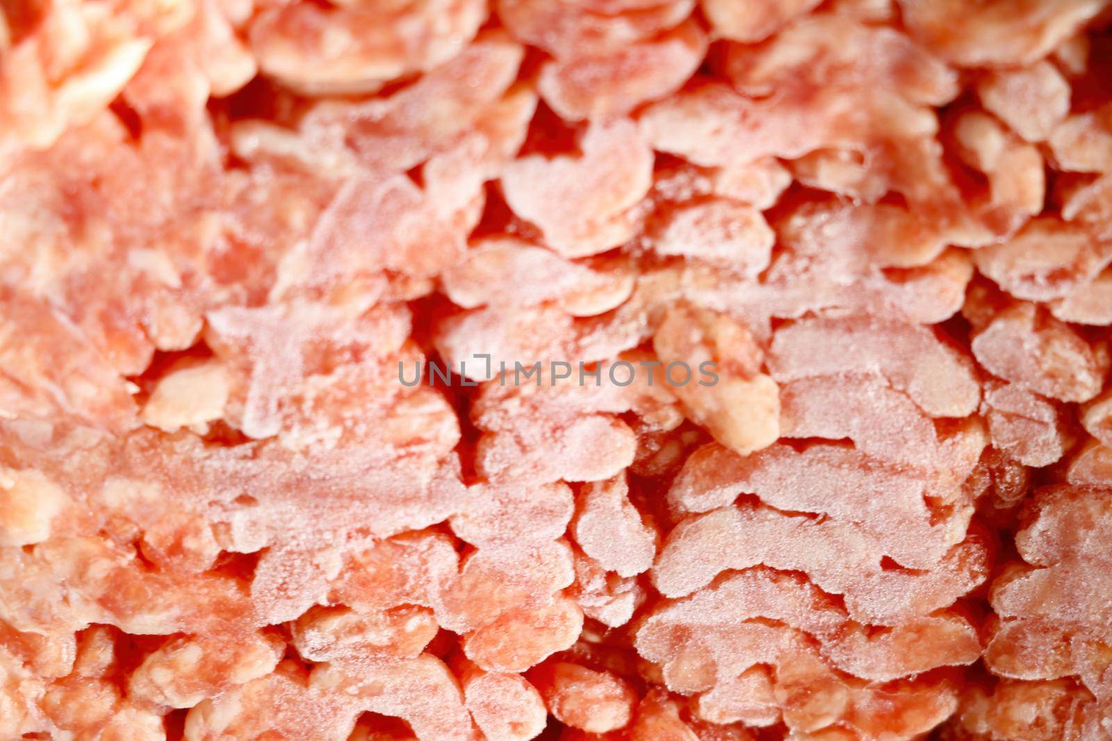 Frozen minced meat texture. Red fresh minced meat