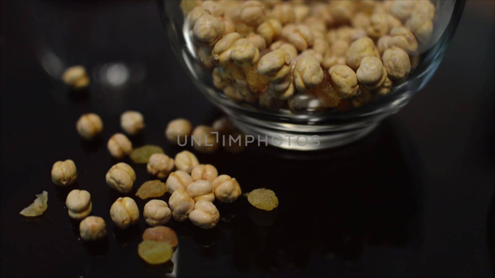 3d illustration - Raisins And Chickpea Macro View in glased Bowl by vitanovski