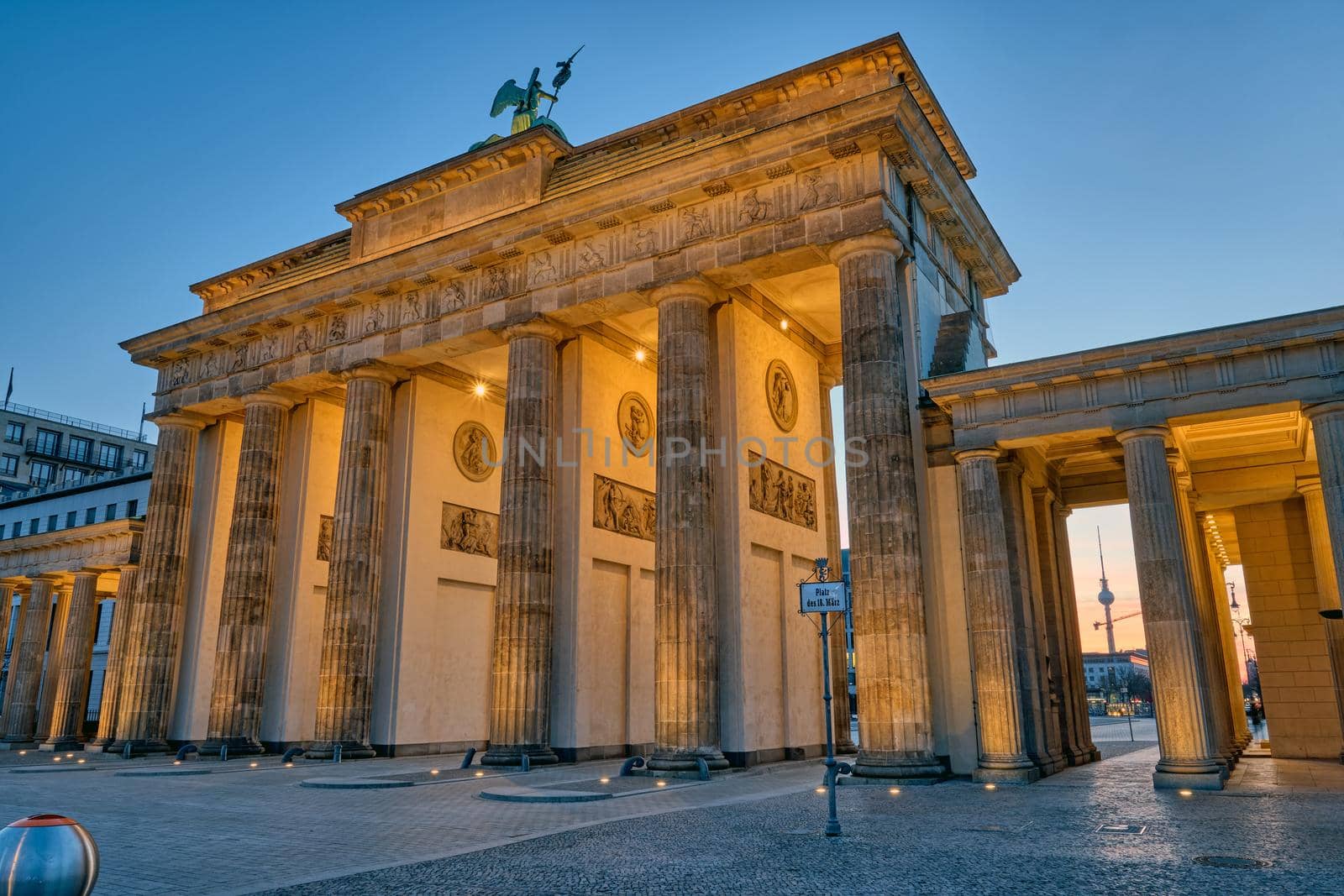 The back side of the famous Brandenburg Gate in Berlin before sunrise by elxeneize