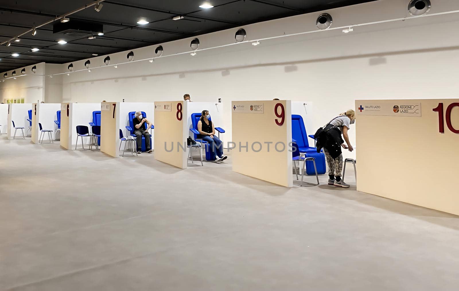 Rome, Italy, June 9, 2021: People being vaccinated in the vaccination center set up inside the Parco della Musica auditorium in Rome, Italy