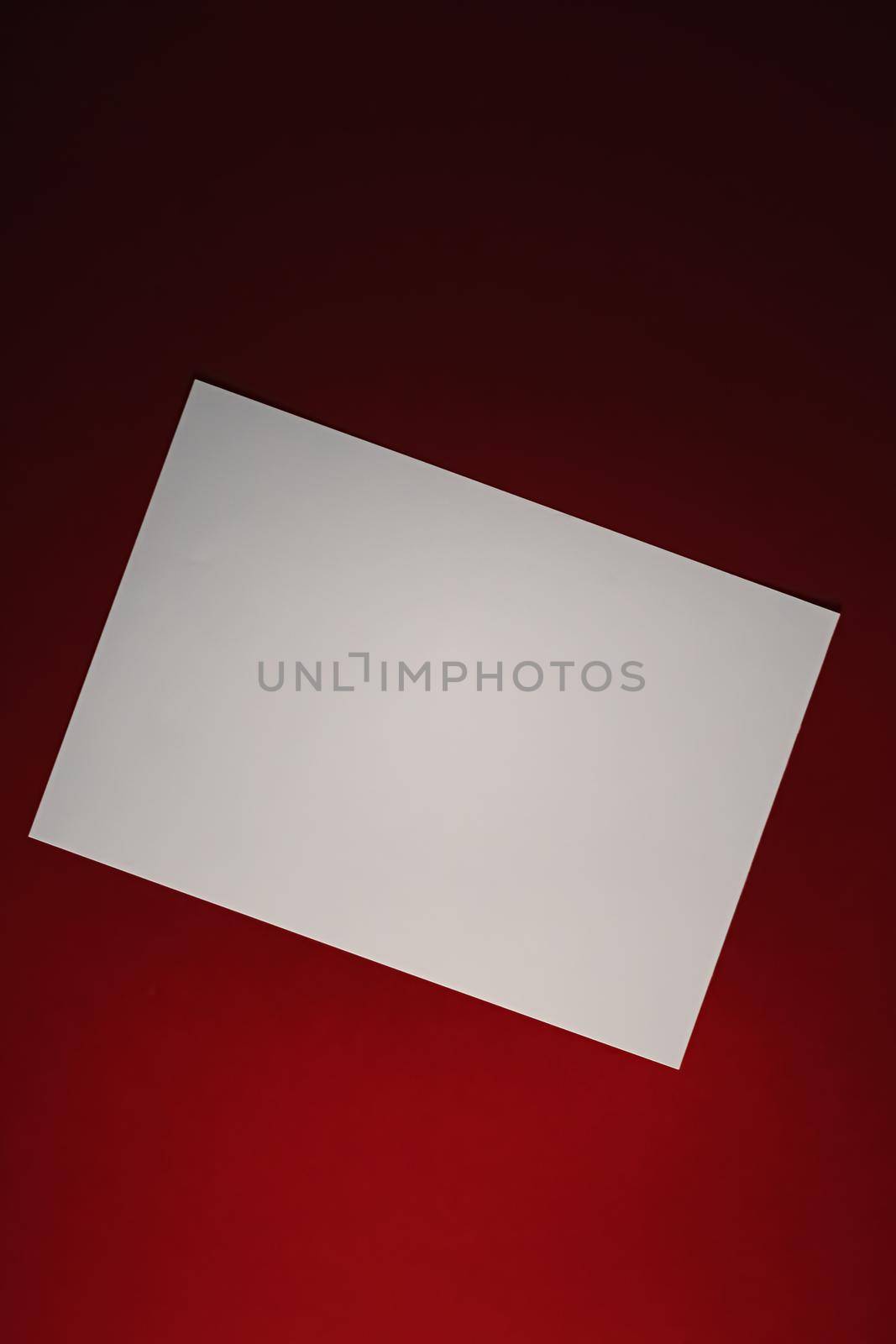 Blank A4 paper, white on red background as office stationery flatlay, luxury branding flat lay and brand identity design for mockup.