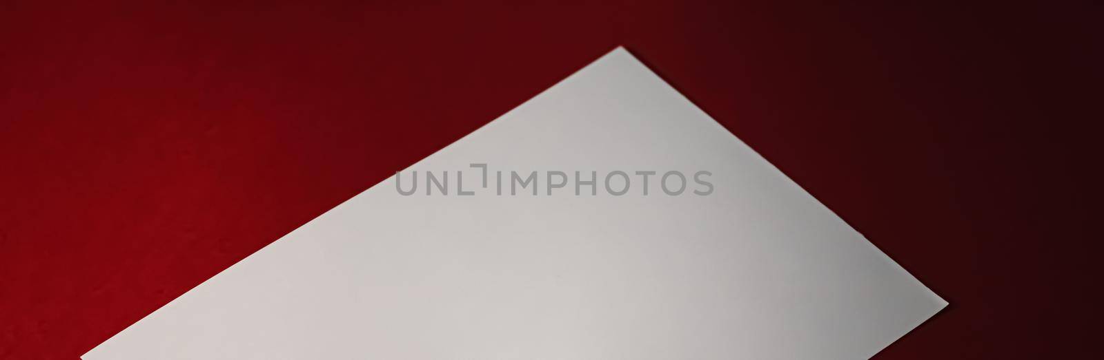 Blank A4 paper, white on red background as office stationery flatlay, luxury branding flat lay and brand identity design for mockup by Anneleven