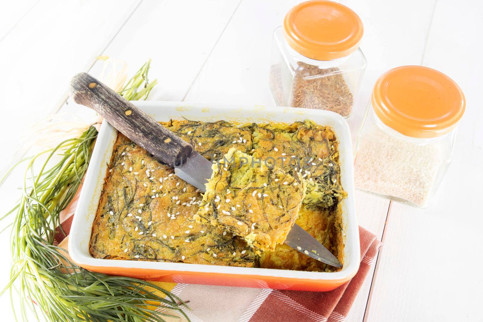 Vegan omelette cuisine with chickpea flour and agretti and turmeric  by fotografiche.eu