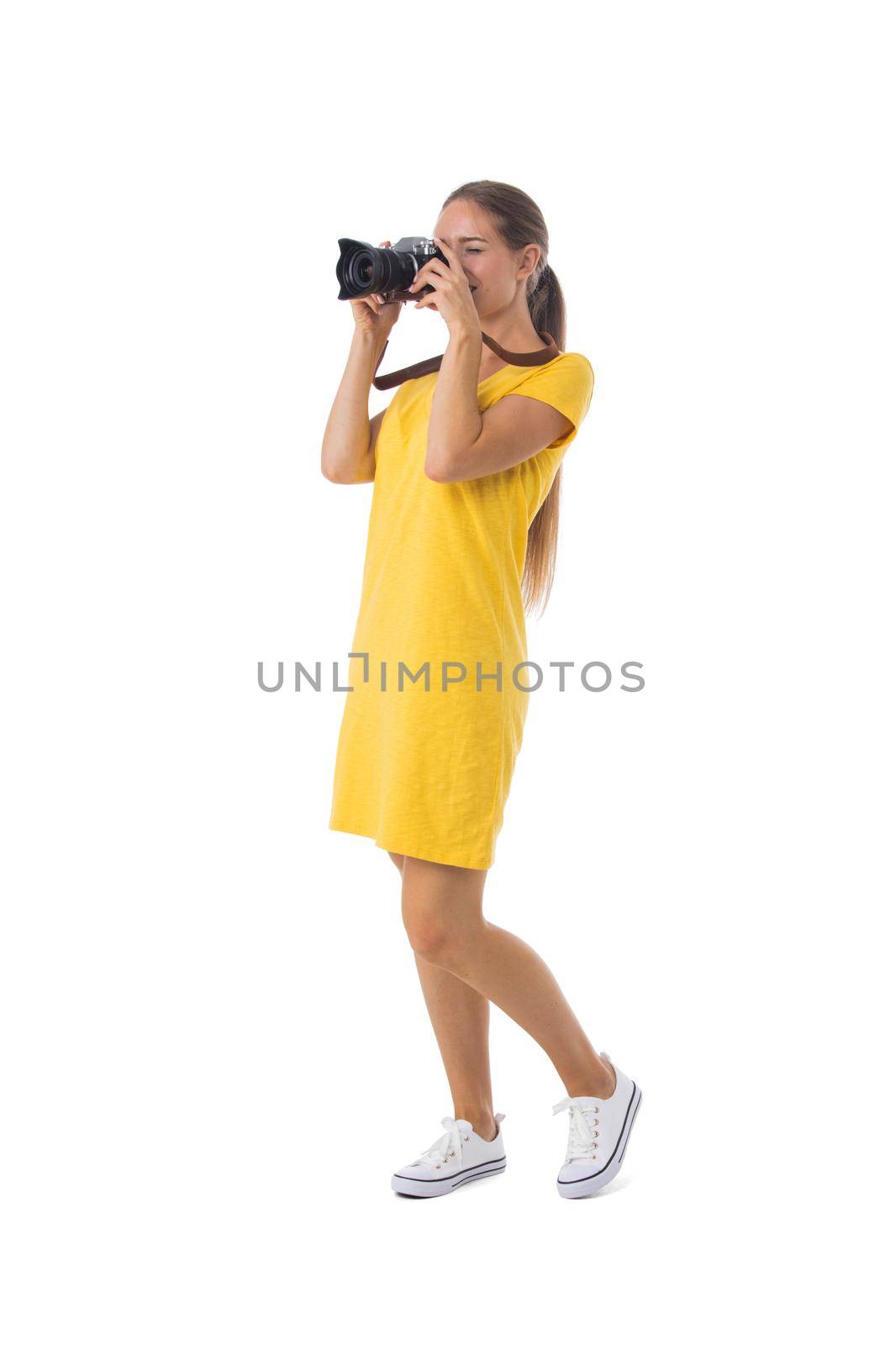 Girl with camera on white by ALotOfPeople